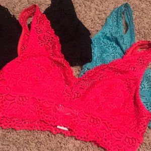 Three lace bralettes